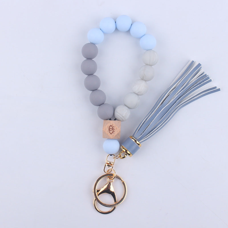 Wholesale Leopard Pattern Silicone Tassel Beaded Wrist Keychain